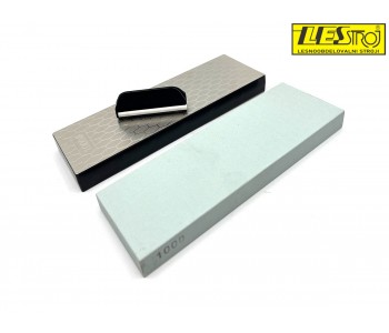 Sharpening stone with knife attachment